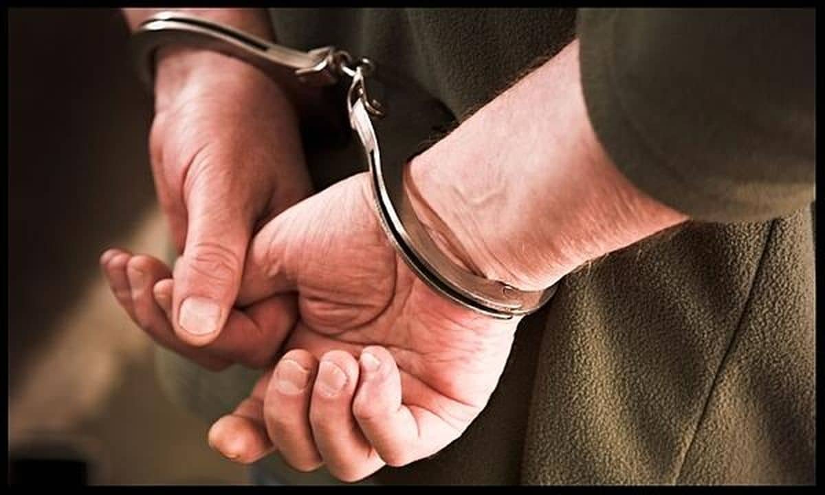 Arrested Man in Handcuffs